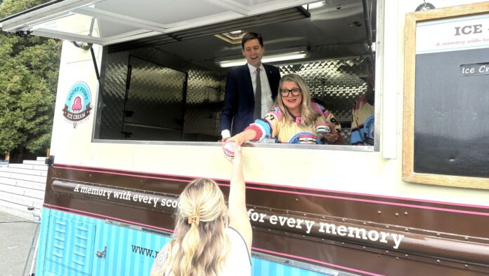 ice cream Premier David Eby and Agriculture Minister Lana Popham mark BC Dairy Day on May 13, 2025 by serving up ice cream from a truck outside the legislature.